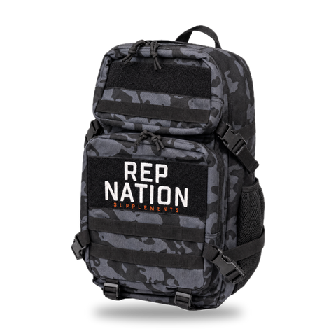 Rep Nation Tactical Bag 65L, three-quarter view with MOLLE webbing and side bottle pocket